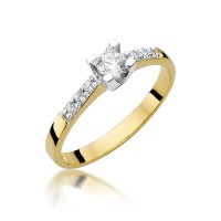 Złoty pierścionek zaręczynowy ozdobiony diamentami 0.37 ct