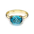 Pierścionek z żółtego białego złota ozdobiony topazem 1,70ct i brylantami