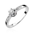 Złoty pierścionek ozdobiony diamentami 0.25 ct