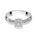 Złoty pierścionek ozdobiony diamentami 0.25 ct