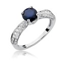 Złoty pierścionek ozdobiony diamentami i szafirem 1.00 ct